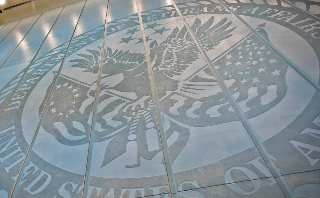 VA Seal etched on glass.